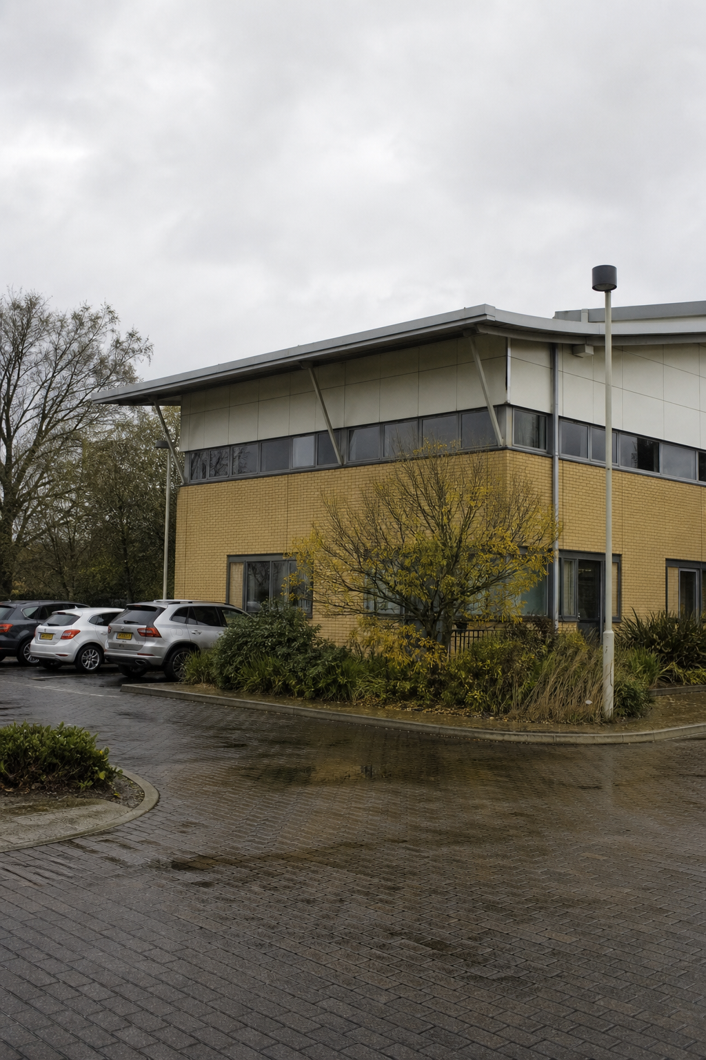 A contemporary low office building at an English eco business park, with no readable signs