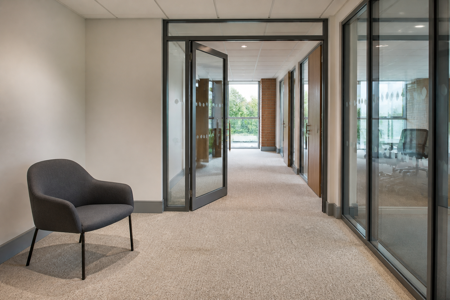 A shared hallway in a modern office building, with no logos